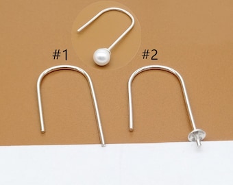 May include: Three silver earring hooks, two with a simple loop and one with a small pearl at the end. The hooks are labeled #1, #2, and #3.