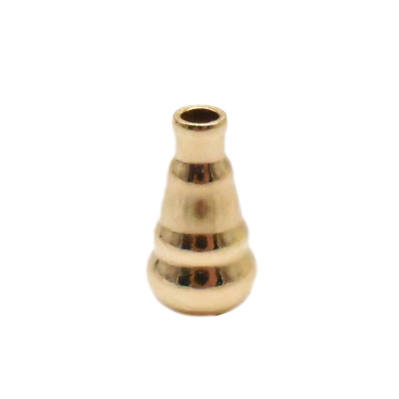 May include: A gold-colored metal pendant in the shape of a vase with a rounded bottom and a narrow opening at the top.