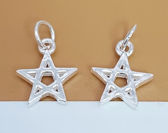 May include: Two silver star-shaped charms with a five-pointed star design and a smaller star in the center. The charms have a loop at the top for attaching to jewelry.
