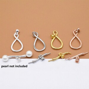 May include: Four infinity-shaped pendant charms in silver, gold, and rose gold. The charms are designed to be used with a pearl or other bead. The text "pearl not included" is visible in the image.