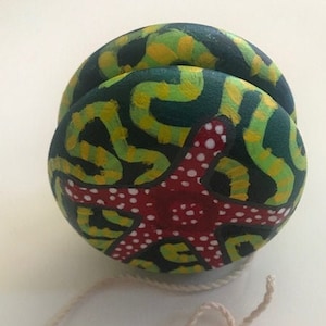 Handpainted wooden yo-yo &quot;Red Starfish&quot; - great gift for the yo-yo enthusiast, or coral reef fan!