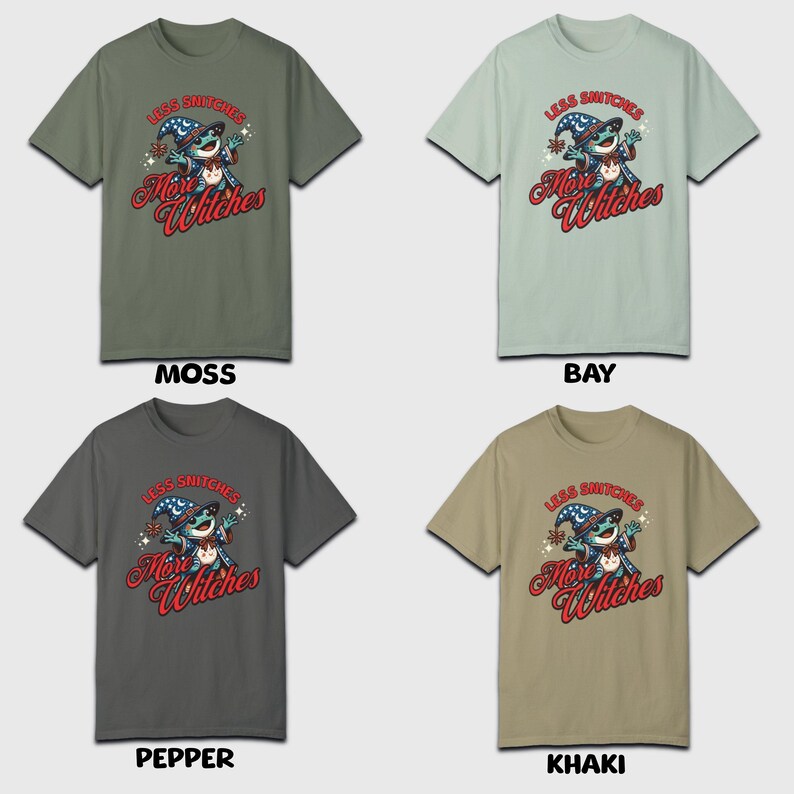 May include: Four t-shirts in different colors, each featuring a cartoon illustration of a frog wearing a wizard hat and holding a wand. The text on the shirts reads "Less Snitchers More Witches". The colors of the shirts are moss, bay, pepper, and khaki.