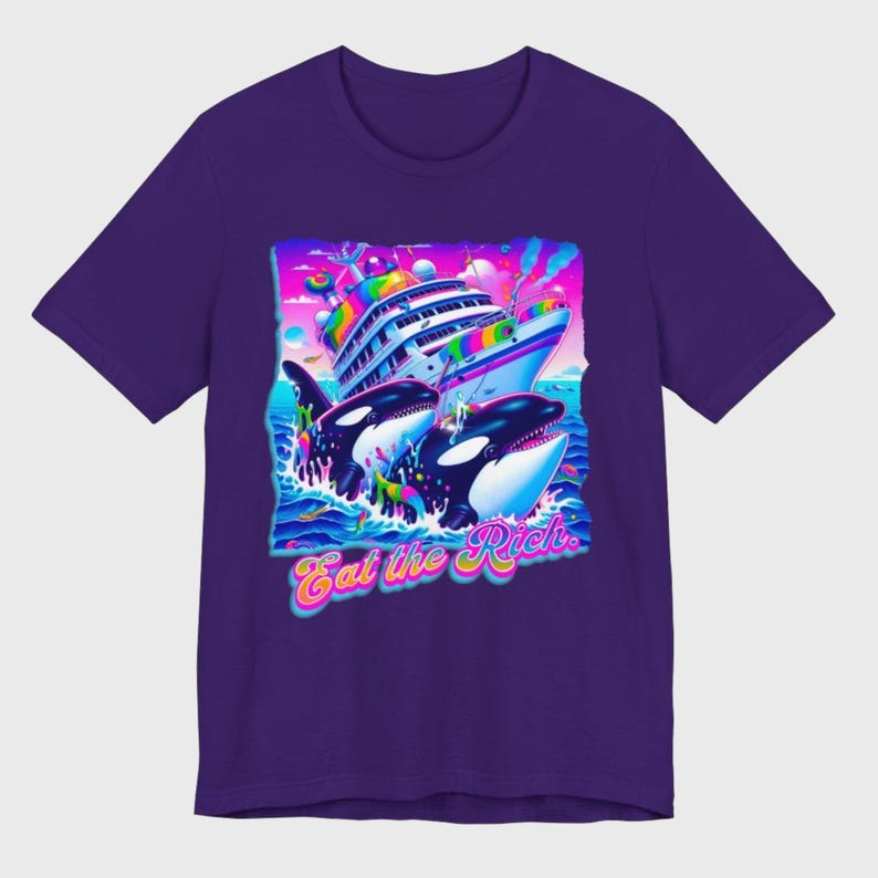 May include: Purple t-shirt with a graphic of two orcas jumping out of the water and attacking a large, rainbow-colored cruise ship. The text "Eat the Rich." is printed below the orcas.