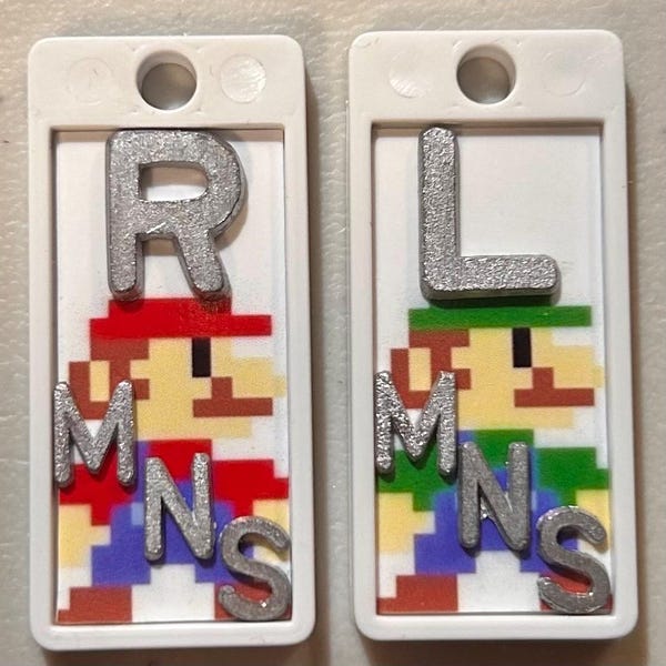 Set med 8-bitars Mario Bros. & Friends Nintendo NES X-Ray-pennor