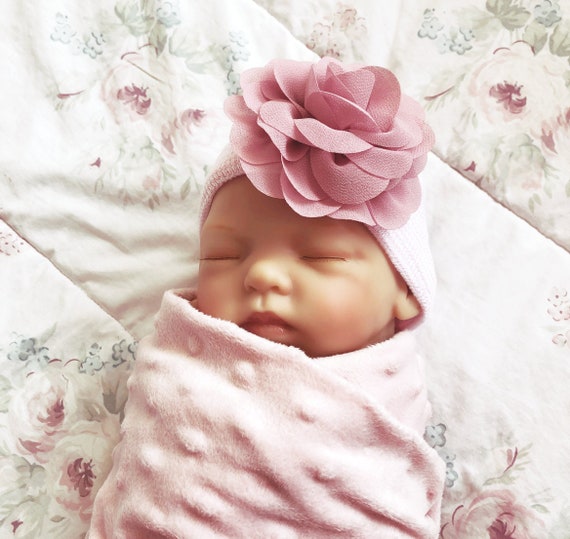 white newborn hat with bow