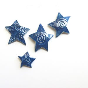 Sapphire Blue Ceramic Star Wall Art: Cosmic Celestial Decor, Set of 4