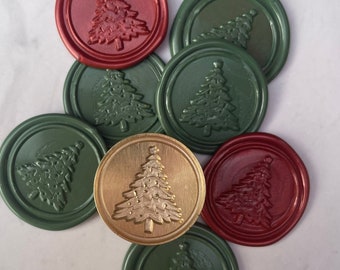 May include: Assortment of green, red, and gold wax seals with a Christmas tree design.