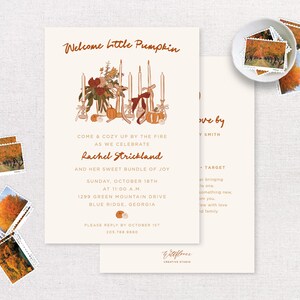 May include: A baby shower invitation with an autumnal theme. The invitation features a hand-drawn illustration of pumpkins, candles, and autumn foliage. The text on the invitation reads "Welcome Little Pumpkin" and includes details about the event, such as the date, time, and location.