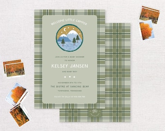 May include: Baby shower invitation with a green plaid pattern and a circular illustration of mountains, trees, and a lake. The text reads "Welcome Little Camper" and includes details for Kelsey Jansen's baby shower.