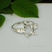 Sterlng Slver Three Stone Desgner Rng Wth A Center 12x10 Oval Pnk Tourmalne and Two 8x6