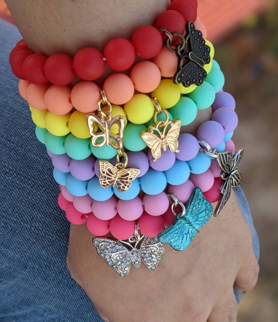 Beaded bracelets with charms deals