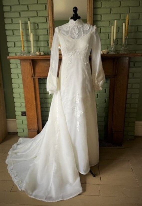 1970s gathered long sleeved wedding dress