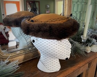 Fabric and faux fur veiled hat