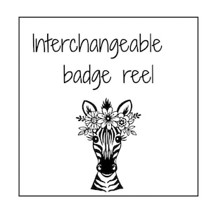 May include: A square graphic featuring the black text "Interchangeable badge reel" above a black and white line art illustration of a zebra head adorned with a floral crown of various flowers and leaves, all set against a plain white background.
