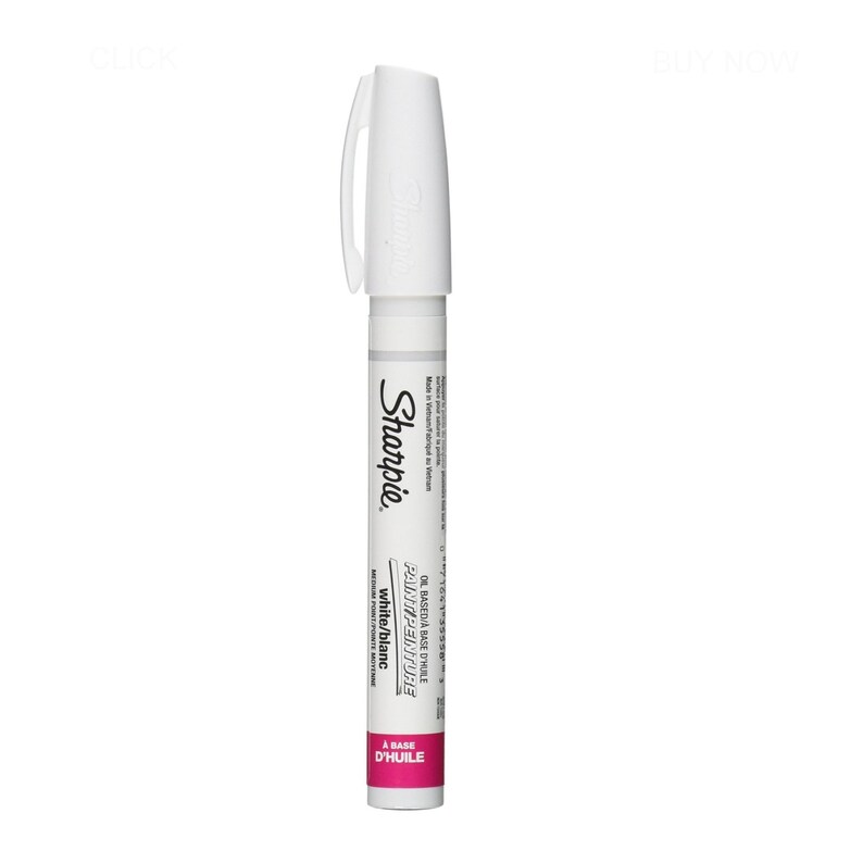 May include: White oil-based paint marker with a black Sharpie logo and the words "Oil Based/Base d'Huile" and "Paint/Peinture" in black. The words "white/blanc" are printed in black below the logo. The marker has a pink cap with the words "A Base d'Huile" printed in white.