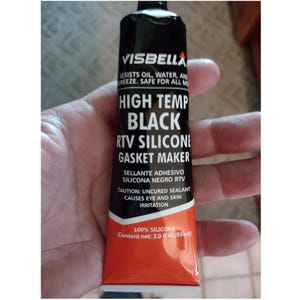 May include: A black tube of Visbella High Temp Black RTV Silicone Gasket Maker. The tube has white text that reads "Resists Oil, Water, and Freeze. Safe for All". The tube contains 3.0 fl oz (85ml) of 100% silicone.