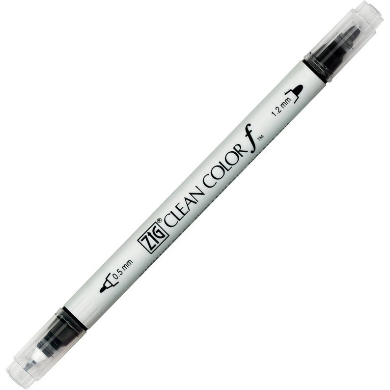 May include: A silver Zig Clean Color Real Brush pen with black ink. The pen has two tips, one 0.5 mm and one 1.2 mm.