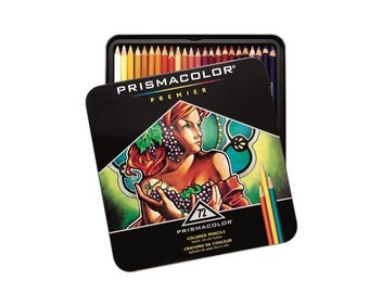 May include: A set of 72 Prismacolor Premier colored pencils in a black tin with a colorful illustration of a woman holding grapes. The tin has the Prismacolor logo and the text "72 Colored Pencils" and "Crayons de Couleur".