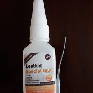May include: A white bottle of leather special glue with a brown label that says "Leather Special Glue" and "L50". The label also says "Faster, Stronger, Tougher, Commercial Grade, Instant Adhesives, Professional Liquid, For bonding of leather for shoes, tags, belts, wallets, and more. Net Wt. 1.06oz (30g)"