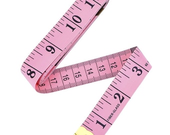 Pink Rubber Tape Measure for Sewing Cloth or Fabric Isolated on the White  Stock Photo - Image of meter, size: 186387728