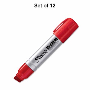 May include: A set of 12 red Sharpie Magnum permanent markers. The markers have a silver barrel with the text "Sharpie Magnum" and "Permanent Markers" printed on the side. The cap is red with the Sharpie logo.