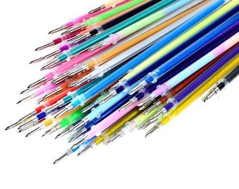 May include: A collection of colorful gel pens with glitter ink. The pens are arranged in a pile, with the tips of the pens pointing in different directions.