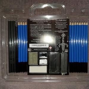 May include: A plastic case containing a drawing set with 12 graphite pencils, 3 charcoal pencils, 3 graphite sticks, 1 plastic sharpener, 1 kneaded eraser, 1 plastic eraser, and 1 pencil holder. The case is labeled "I'm a Castle Artist" and includes the text "Castle Art Supplies".