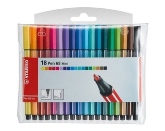 May include: A set of 18 Stabilo Pen 68 Mini markers in a clear plastic pouch. The markers are arranged in two rows of nine, with the caps facing up. The markers are in a variety of colors, including red, orange, yellow, green, blue, purple, and brown. The pouch has a white label with the text "18 Pen 68 Mini" printed on it.