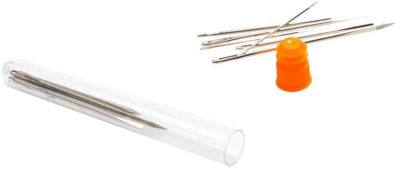 May include: A set of 10 silver sewing needles in a clear plastic tube with an orange cap. The needles are arranged in a bundle and are ready for use.