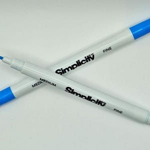 2 rotuladores de costura azules solubles en agua; tinta que desaparece, lavables, punta fina y mediana.
