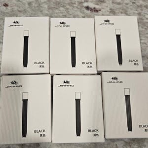 May include: Six white boxes with a black pen design and the word "BLACK" in English and Chinese. The brand name "JINHAO" is printed at the top of each box. The pens have a silver cap and a black body.