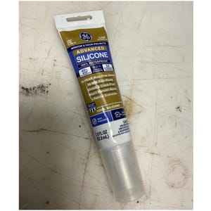 May include: A tube of GE Advanced Silicone sealant for window and door projects. The tube is white, gold, and blue, with text indicating it is 100% waterproof, mold-free, and shrink-resistant. It contains 2.8 fl oz (82.8 mL).