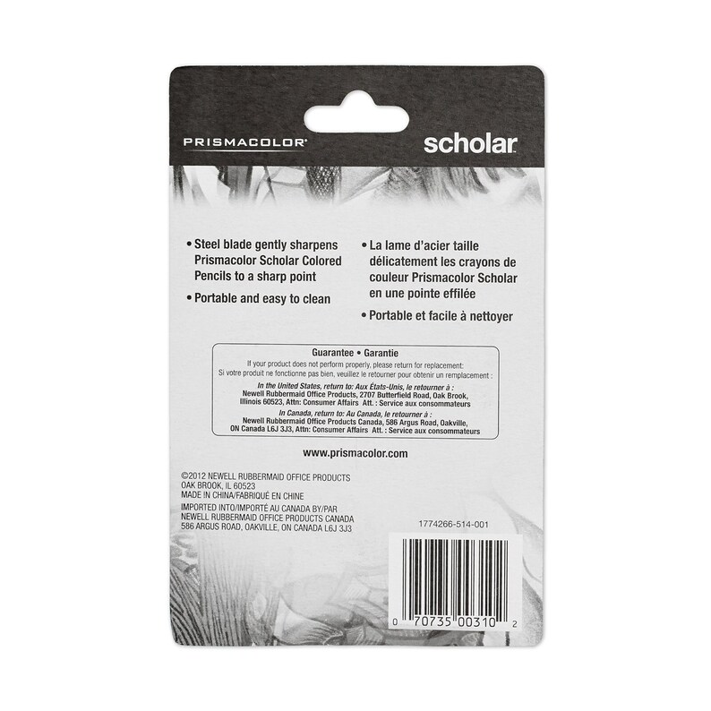 May include: A Prismacolor Scholar colored pencil sharpener with a steel blade. The sharpener is black and white with the Prismacolor and Scholar logos. The back of the sharpener has instructions for use and a guarantee.
