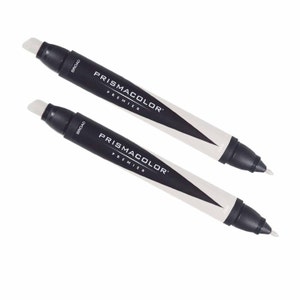 May include: Two white Prismacolor Premier broad-tip markers with black caps and white chisel tips.