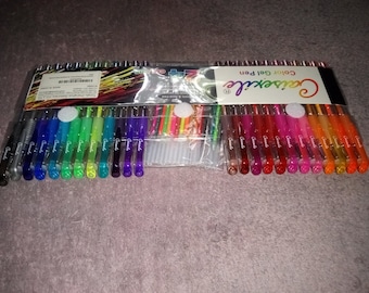 May include: A set of 40 colorful gel pens in a clear plastic package. The pens are arranged in two rows, with the top row containing 20 pens and the bottom row containing 20 pens. The pens are all different colors, including red, orange, yellow, green, blue, purple, pink, and black. The package also includes a small card with the brand name "Crayola" printed on it.