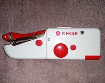 Tragbare kabellose Handnähmaschine; Singer Taschen-Nähmaschine Rot & Weiss
