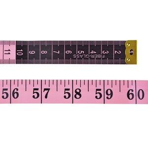 May include: A close-up of two measuring tapes. One is black with white numbers and markings, and the other is pink with black numbers. The black tape reads up to 11 inches, and the pink tape reads up to 60 inches.