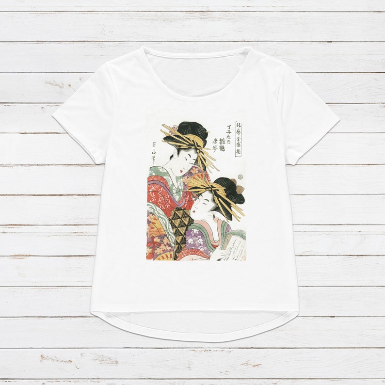 May include: White t-shirt with a colorful Japanese woodblock print of two women in traditional clothing. The text on the shirt reads "Early Edo Period,  Famous courtesan"