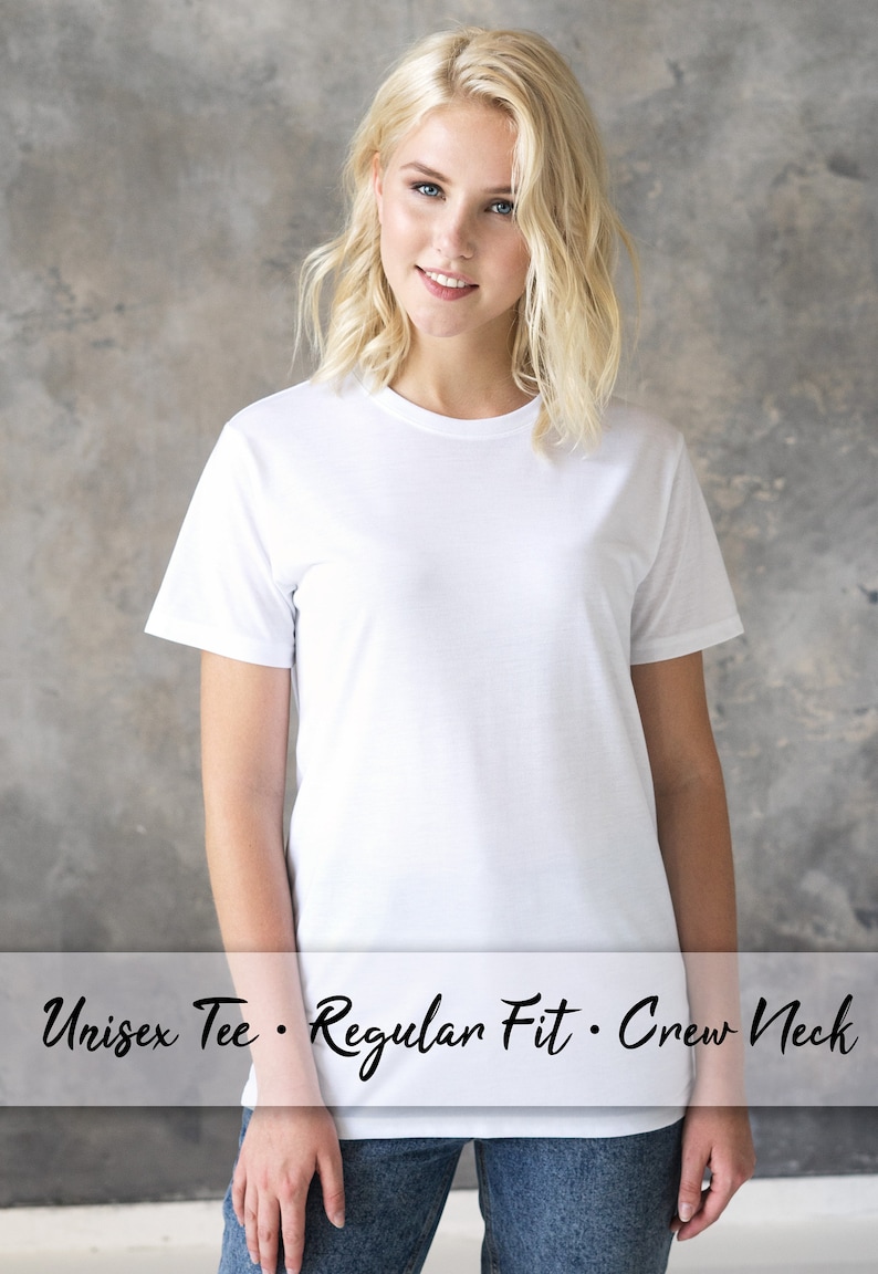 May include: A white unisex crew neck t-shirt with a regular fit. The t-shirt is shown on a model wearing blue jeans.