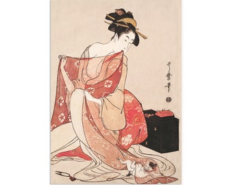 May include: A Japanese woodblock print depicting a woman in a red and white kimono, sitting on a floor with a small figure at her feet. The woman is holding a corner of her kimono and looking down at the figure. The print is in shades of red, white, and black.