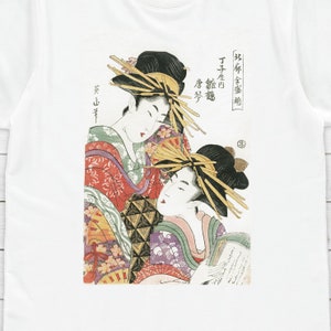 May include: A vintage Japanese woodblock print featuring two women in traditional clothing. The women are depicted with intricate hairstyles and elaborate kimonos. The print is in shades of red, green, yellow, and black.