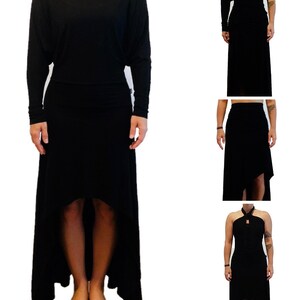 May include: A black high-low dress with long sleeves and a halter top. The dress is made of a soft, stretchy fabric and has a flowing silhouette.