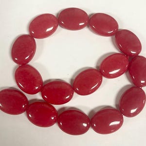 Ruby Jade 27x20x10mm Oval Gemstone Bead-- -15.5 inch strand-