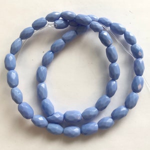Blue Quartz 9x6mm Faceted Oval Gemstone Beads - 15.5 inches strand
