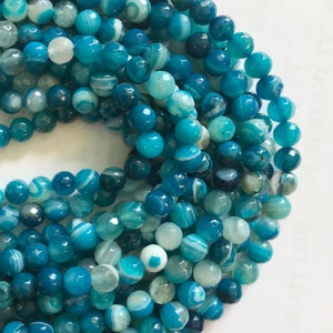 Sardagate 6mm Faceted Round Gemstone Bead--15.5 inch strand