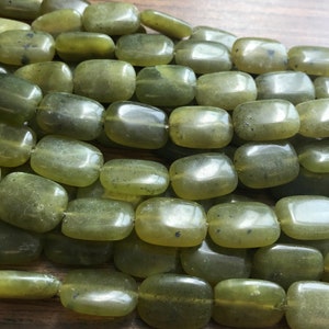 May include: A strand of smooth, green jade beads, each bead is rectangular and polished, with a subtle shimmer.