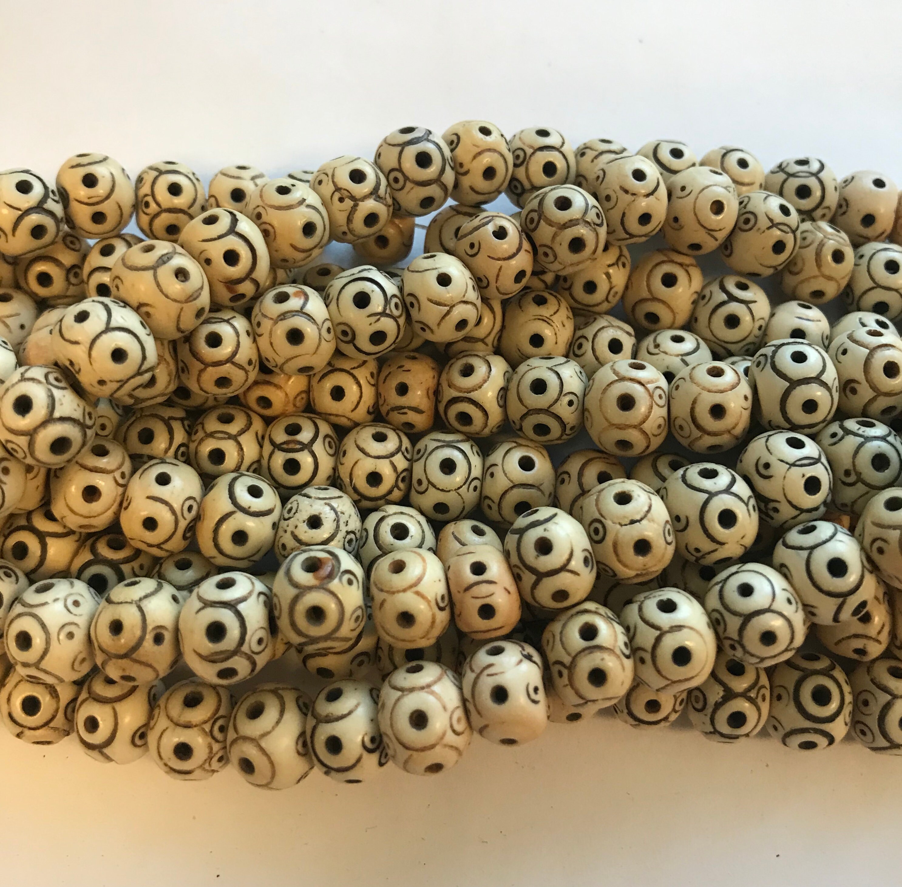 Hand Carved Bone Semi-Round Beads 8 x 7mm avg.