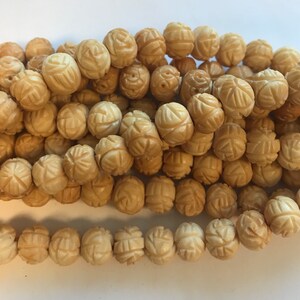 Carved Bone 10x8mm Rondelle Bone Bead-7.5 inch strand