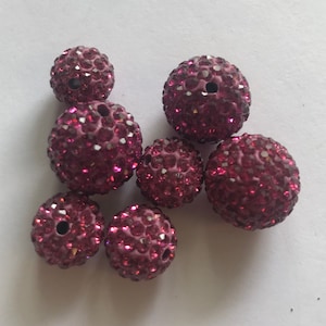 10 piezas de cuentas espaciadoras de cristal brillante de color rojo de 6 mm, 8 mm, 10 mm, 12 mm y 14 mm.