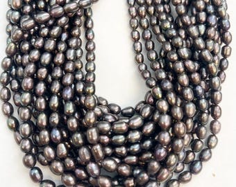 Natural Fresh Water Pearl 5x(6-7)mm Oval Pearl Bead -15.5 inch strand